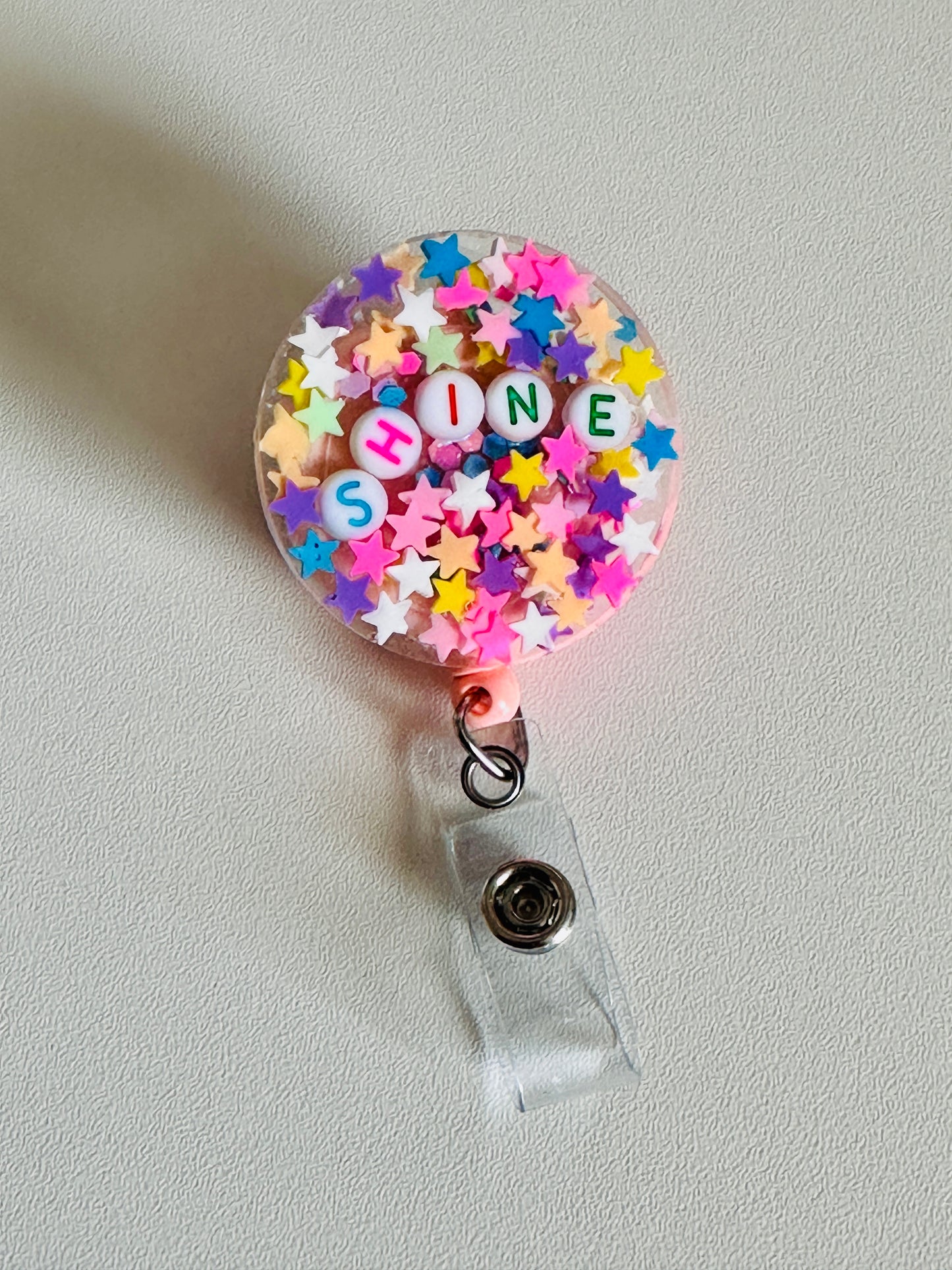 Shine Badge Reel