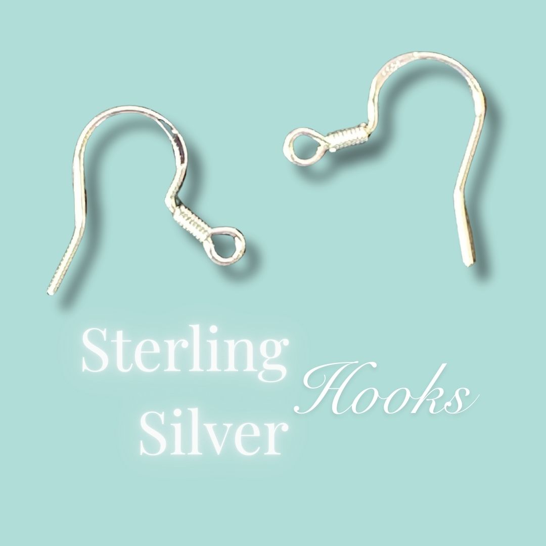 "Close-up detail of large Sterling silver earring hooks on a light blue background with the 'Sterling Silver Hooks' text.
