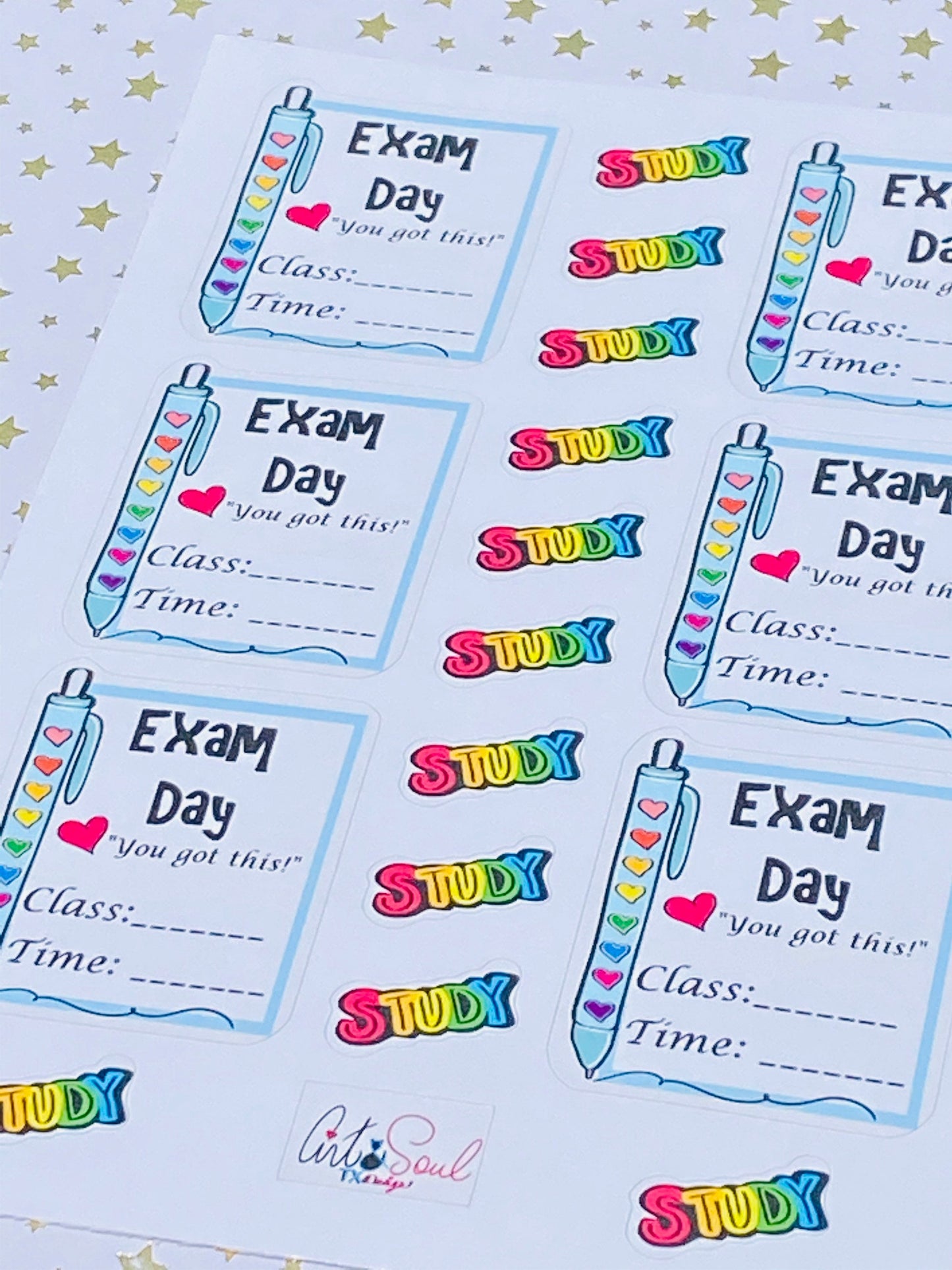 A close-up of the sticker sheet. The Exam Day sticker has a pen with colorful hearts and lines to write the time and subject of the exam. The Study stickers show the word "study" in red, yellow green, and blue rainbow colors.