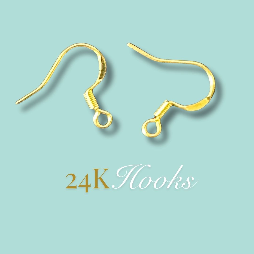 "Close-up detail of large 24K gold earring hooks on a light blue background with the '24K Hooks' text.
