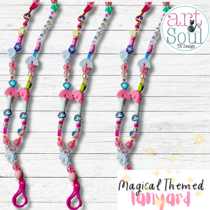 Three Magical Unicorn Lanyards laying next to each other on a white table top.