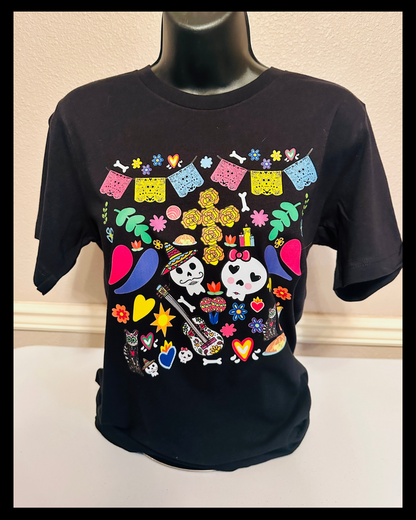 Hand designed Dia de los Muertos t-shirt displayed on mannequin showing fit and design placement.