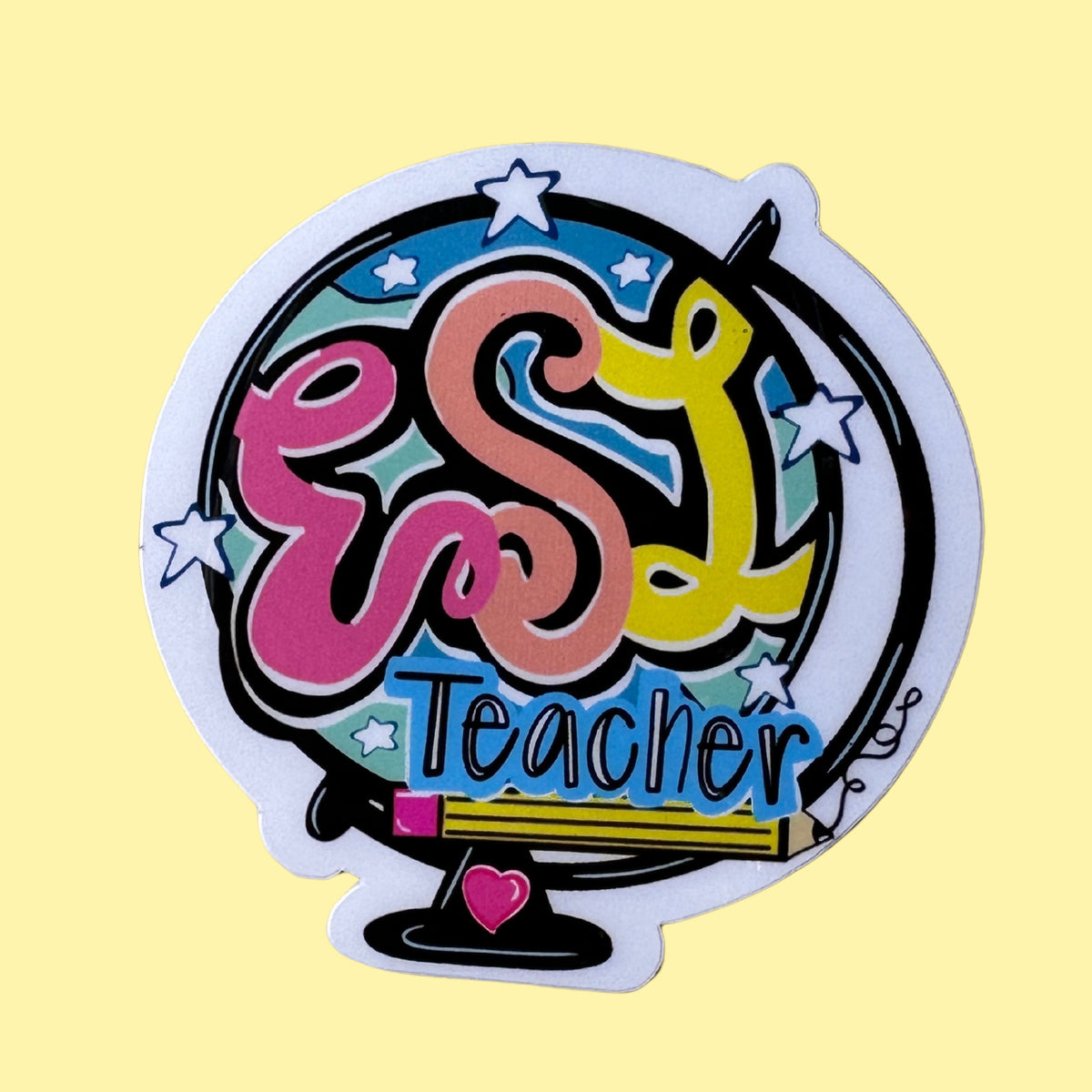 A colorful “ESL Teacher” Vinyl Sticker on a Yellow Background.