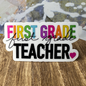 A close-up of our First Grade Teacher waterproof vinyl sticker. 