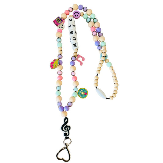 Colorful beaded lanyard with music-themed charms on a white background