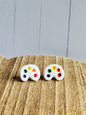 Original handcrafted art palette stud earrings perfect for teachers, featuring vibrant blue, green, yellow, orange, and red paint dots on white palette design.  These studs are lightweight and inspiring jewelry for educators.