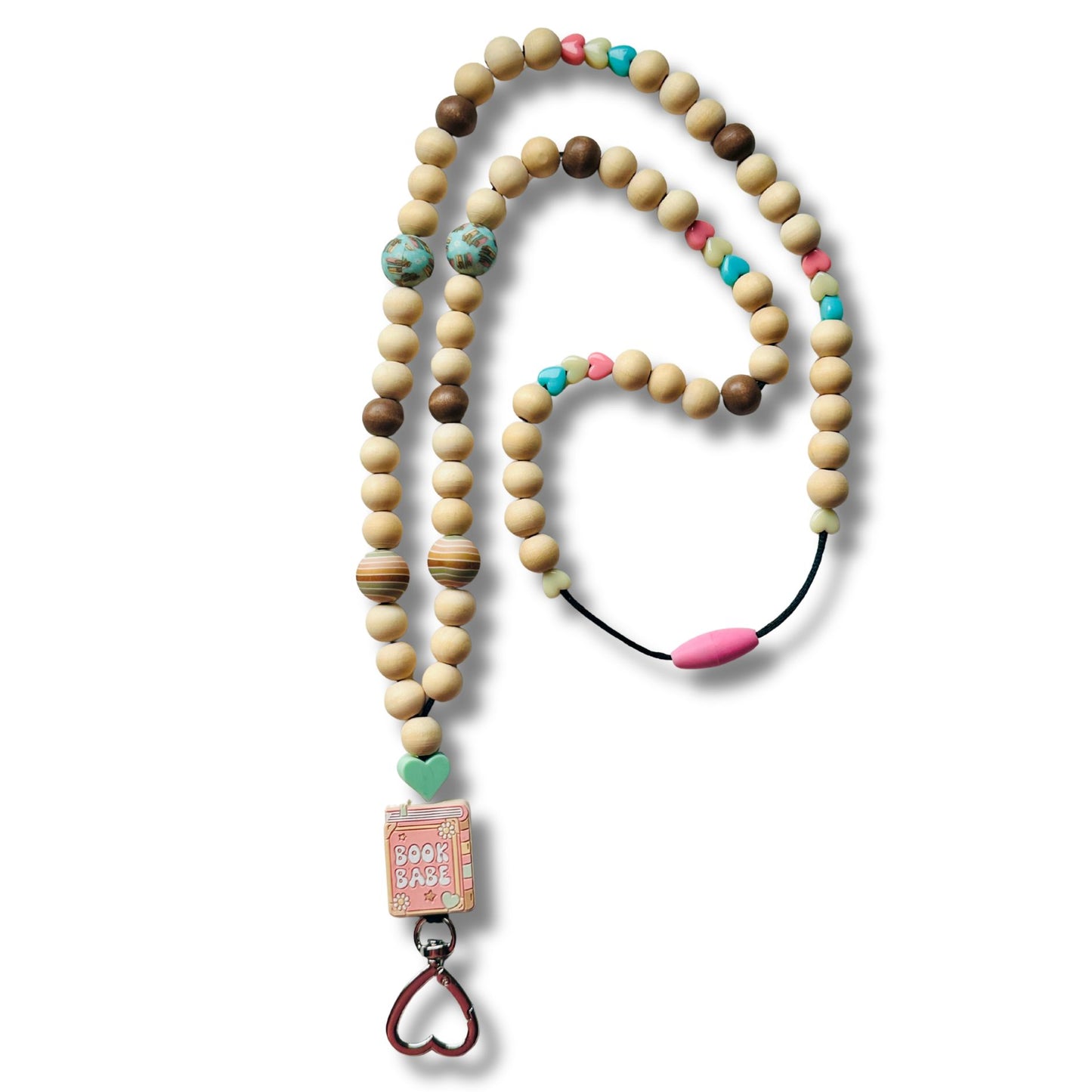 Lanyard with wooden beads and colorful book related accents on a white background