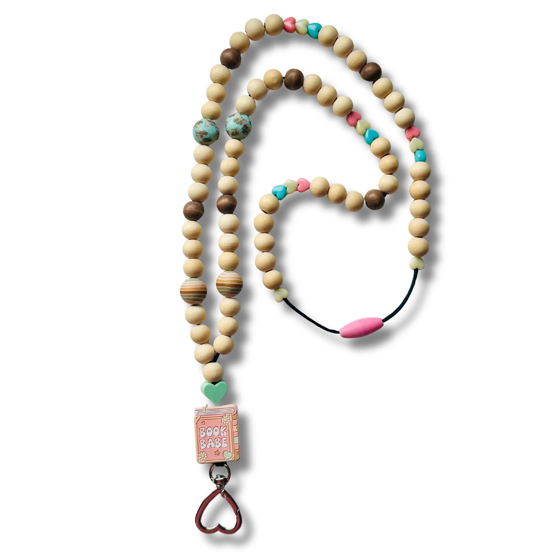 Lanyard with wooden beads and colorful book related accents on a white background