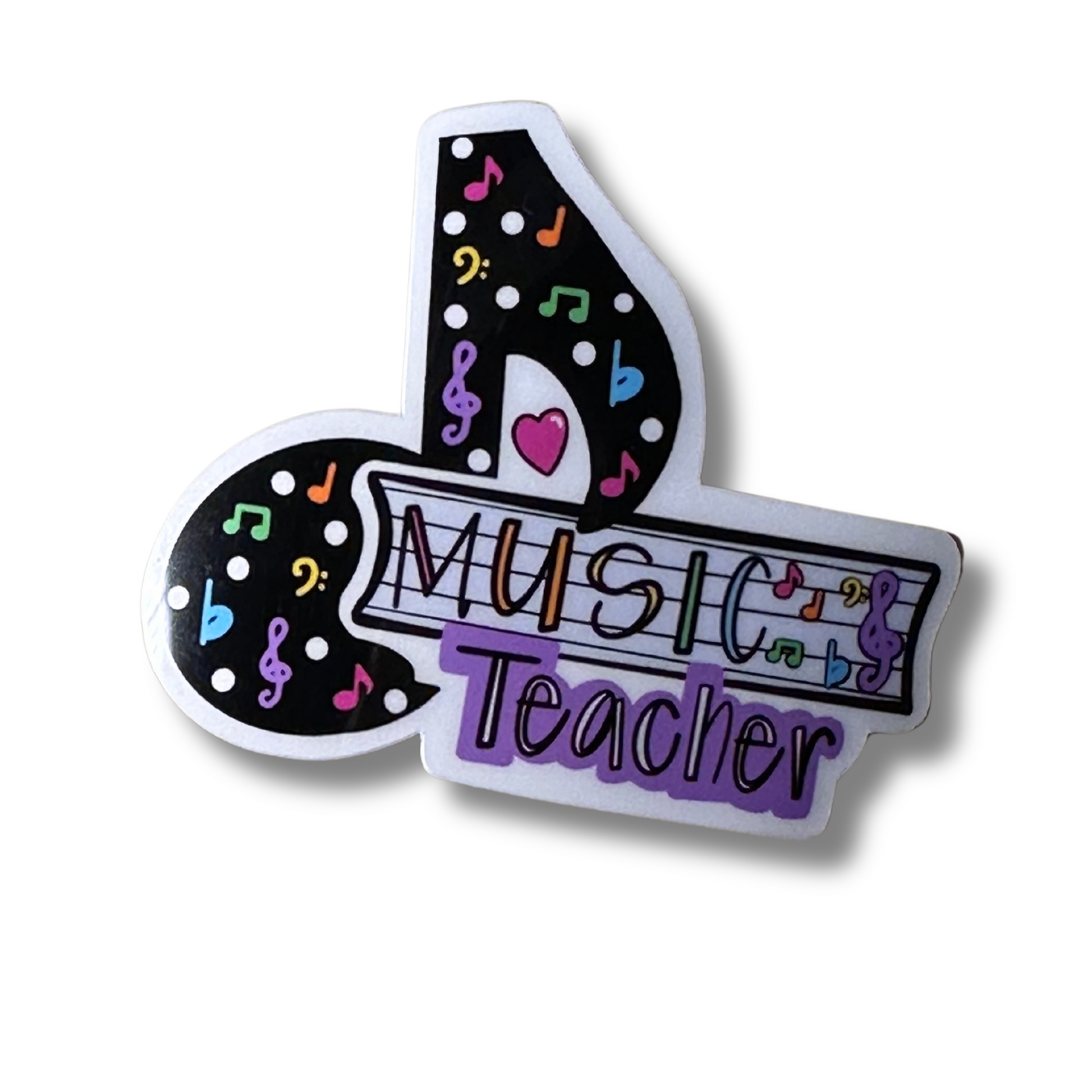 Close-up of Music Teacher vinyl sticker featuring a bold musical note with "Music Teacher" written on a music sheet, white background.