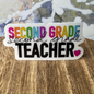 A close-up of our Second Grade Teacher waterproof vinyl sticker. 