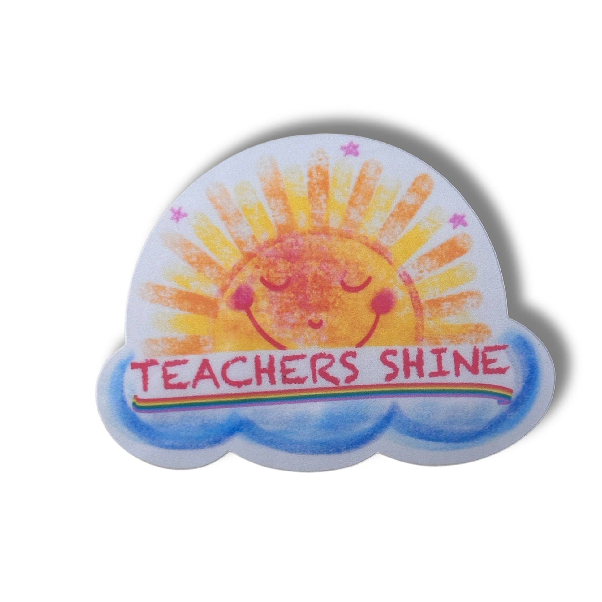 Close-up of Teachers Shine waterproof vinyl sticker on white background, showing watercolor sun and "Teachers Shine" in chalk-style font.