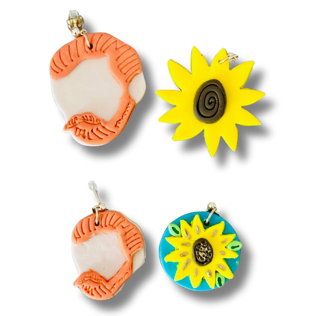 Two pairs of colorful Van Gogh earrings on a white background.  
Top row shows large earrings with Van Gogh's silhouette on the left and yellow sunflower on the right.  
Bottom row shows small earrings with Van Gogh's silhouette on the left and yellow sunflower on blue circle background on the right. 