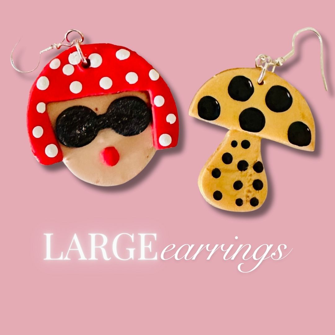 Two unique earrings on a pink background with 'LARGE earrings' text to show the specific size.