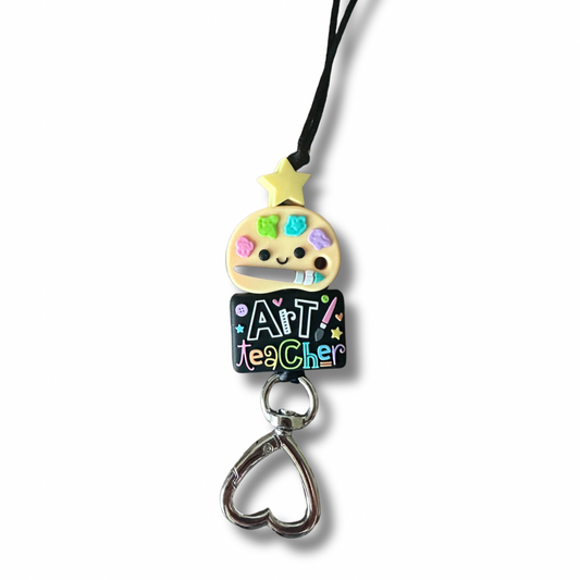 Lanyard with a colorful 'Art Teacher' badge holder on a white background