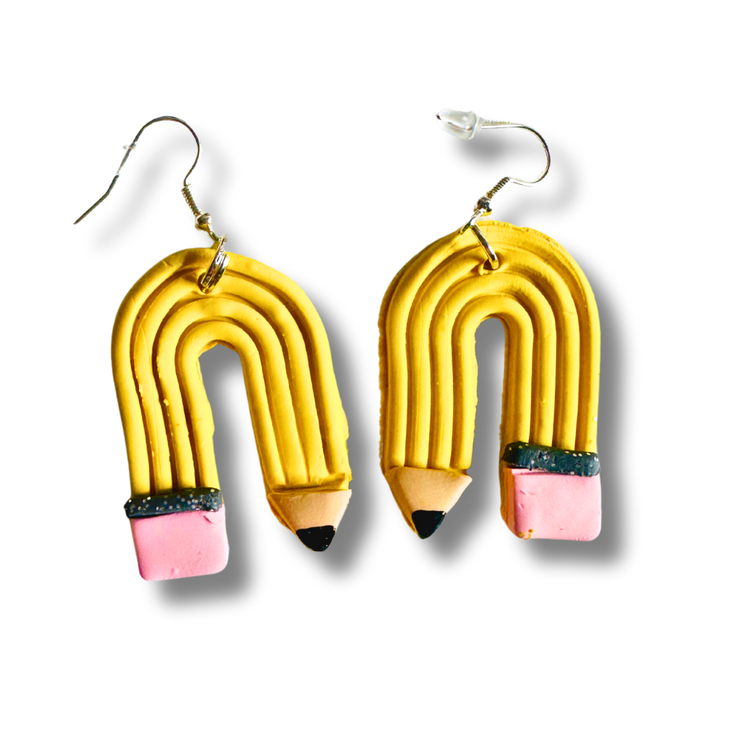 Curved .polymer clay pencil earring in rainbow arc shape with sterling silver hook on white background