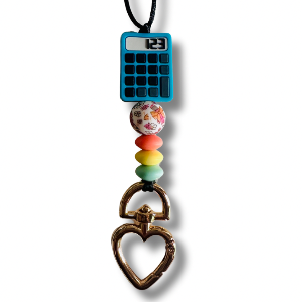 Close-up of red, yellow, and blue silicone beads and heart clasp on Math Teacher Lanyard