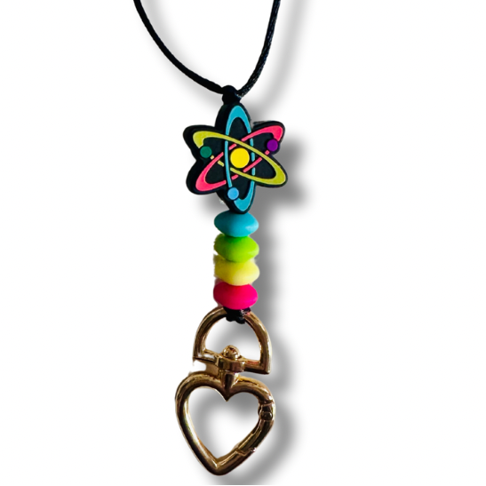 Close-up of blue, green, yellow, and red silicone beads and heart clasp on Science Teacher Lanyard.