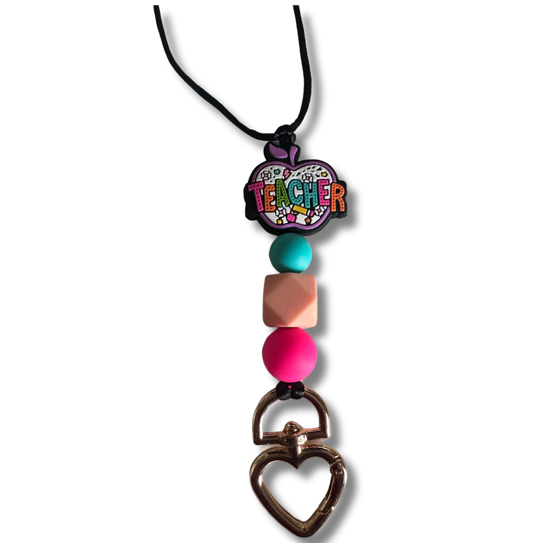 Close-up of colorful silicone beads and heart-shaped metal clasp on Teacher Apple Lanyard
