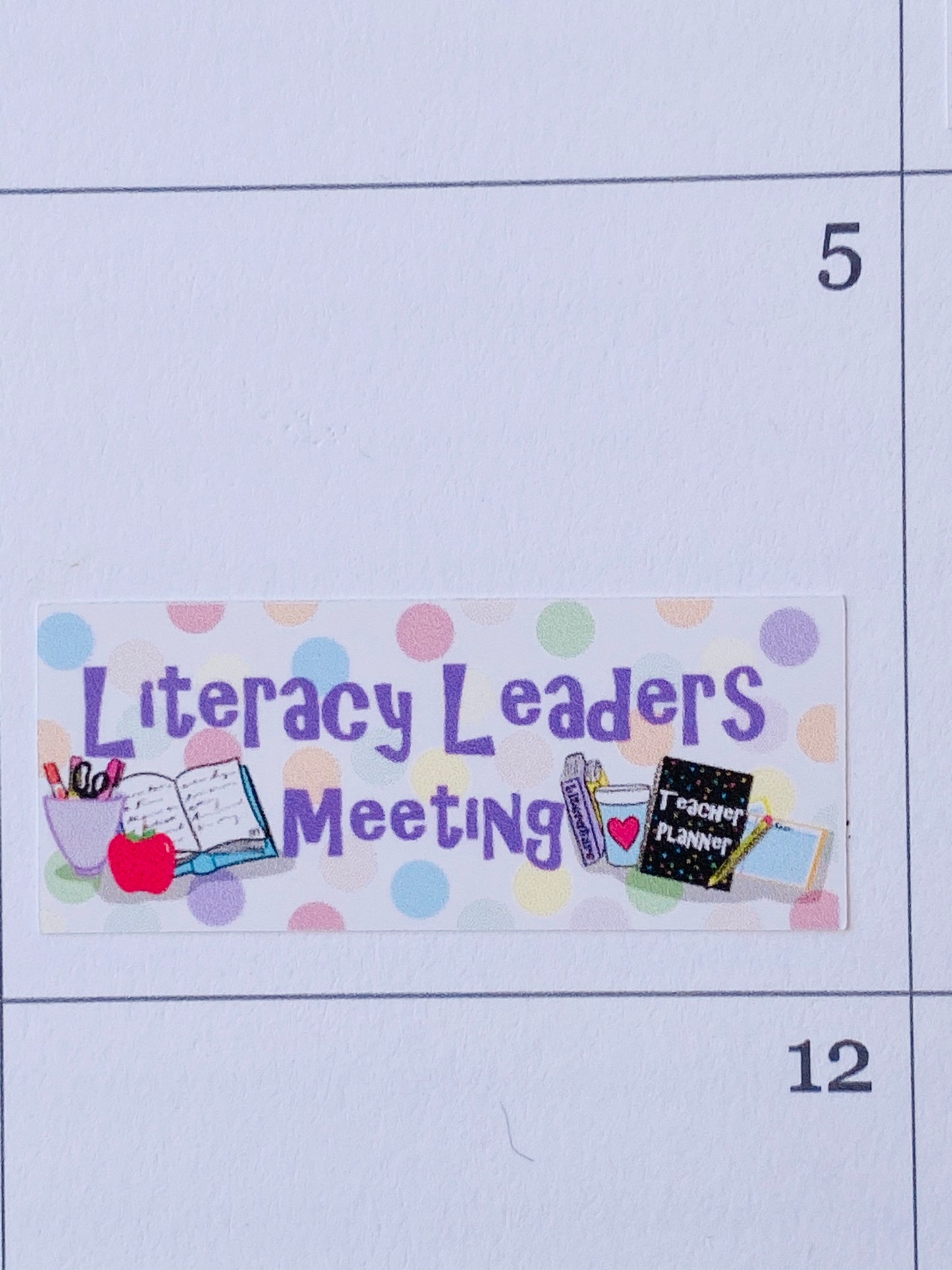 Single Literacy Leaders Meeting sticker in teacher planner calendar page showing size and placement in use.