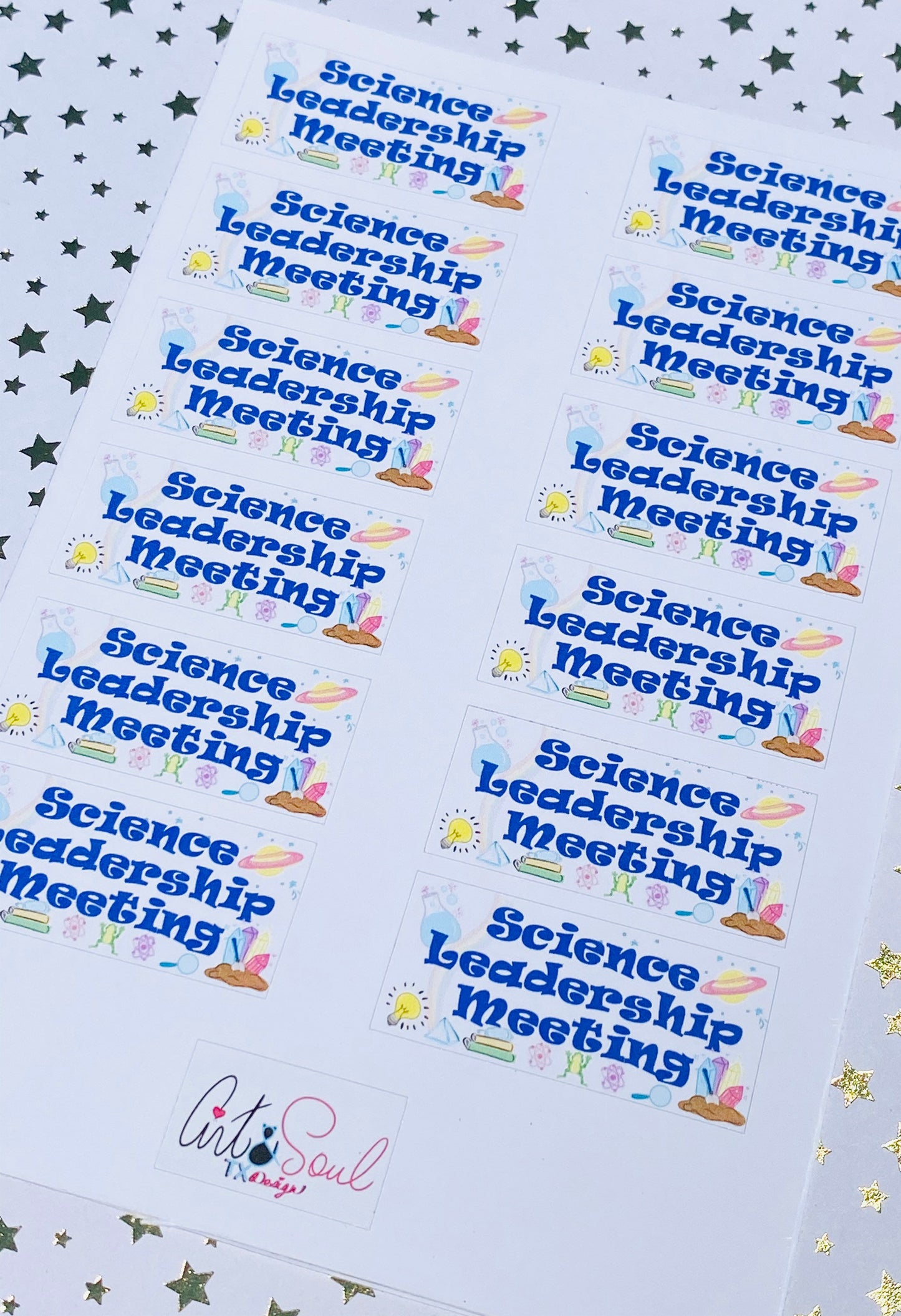 Angled view of science leadership meeting planner sticker on starry background with science themed icons.