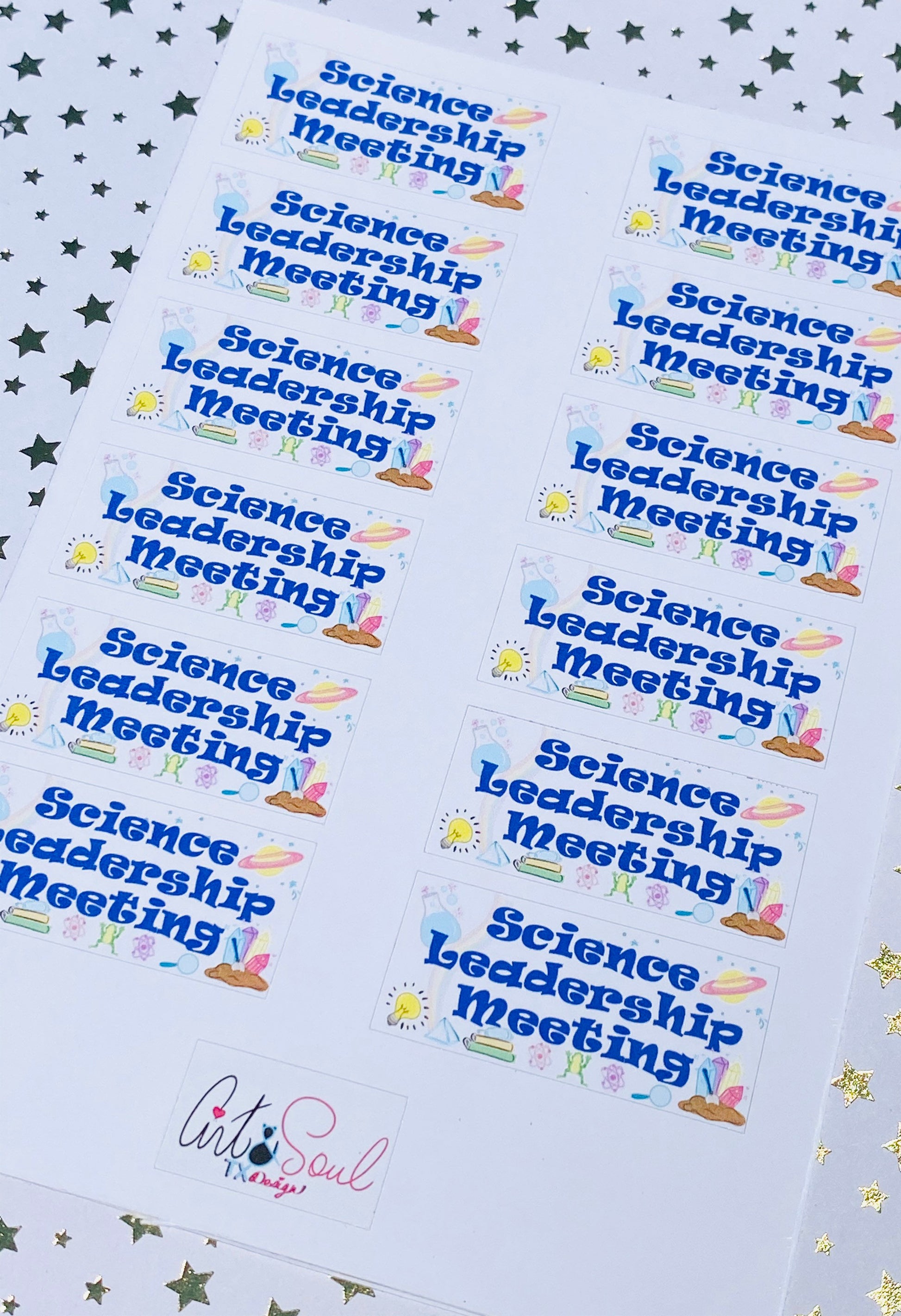Angled view of science leadership meeting planner sticker on starry background with science themed icons.