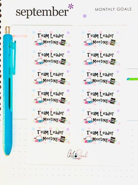 Team Leader Meeting sticker sheet in teacher planner next to pen showing size, matte vinyl finish.